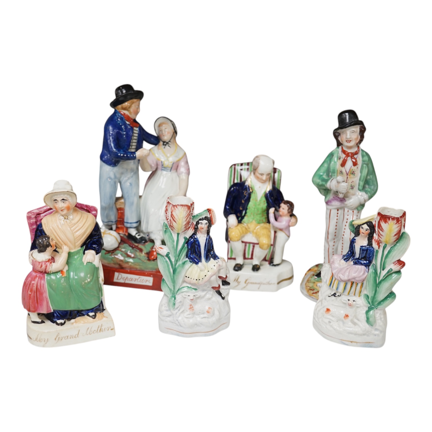 Six mid 19th century Staffordshire figures or groups: a pair titled ‘my grandmother and my grandfather’, a double sided water/gin figure, a pair of figural spill vases and a pearlware group titled ‘Departure’, the talles